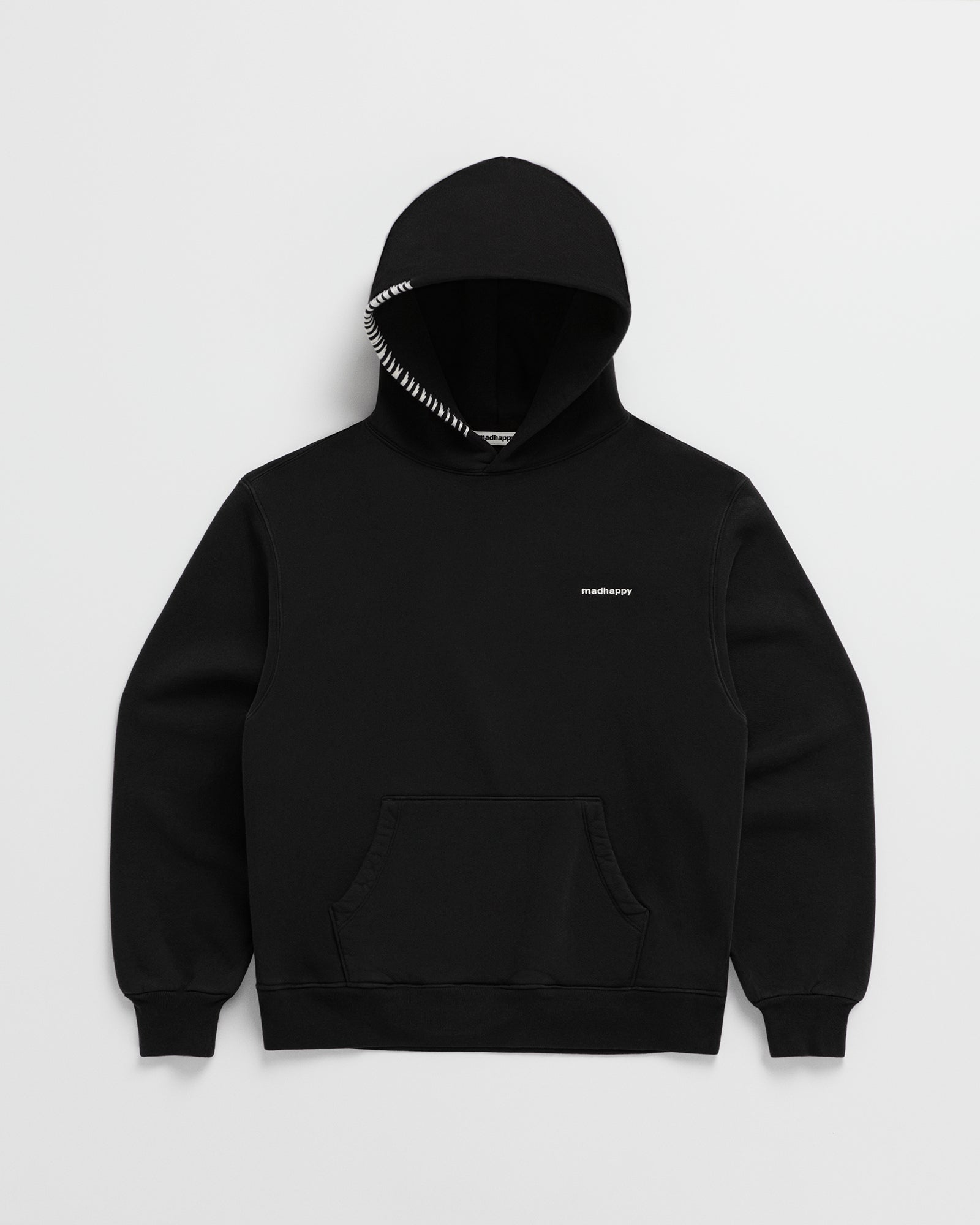 https://madhappy.com/cdn/shop/files/Madhappy-New-Wordmark-Core-Classics-Fleece-Hoodie-Flat-Jet-01_f7fa6524-f781-47c0-9528-8e7d7382a291.jpg?v=1726254285&width=2400